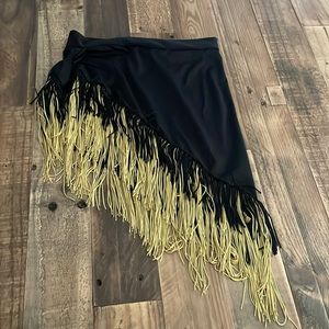 This is a ballroom skirt with gold and black tassels. Size MC.